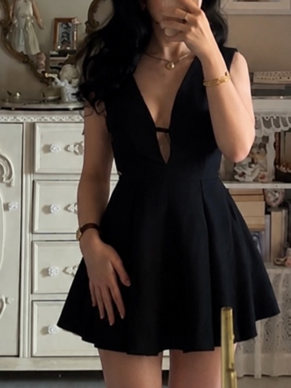 Sleeveless Black V-Neck Mini Dress with Flared Skirt